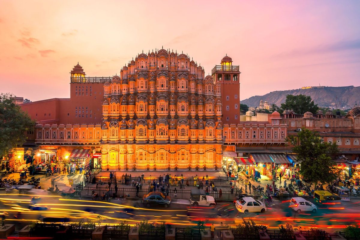 Hawa Mahal lit at dusk in the old city of Jaipur